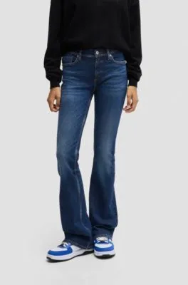 Flared low-rise jeans in dark-blue stretch denim