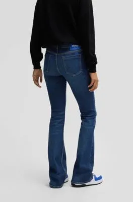 Flared low-rise jeans in dark-blue stretch denim